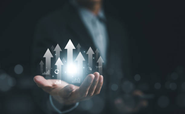 istock Business growth and performance analytics concept. businessman presenting growth arrows and performance indicators holographically in futuristic business analysis. planning target strategy, investment 2086436222