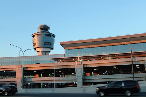 A picture taken of the passenger concourse and control tower at LaGuardia Airport around 5:00pm