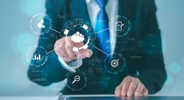 istock Customer relations, business management, internet, technology icons set Businessman's hands holding human icons for customer value and customer service and corporate concepts. 2086470437