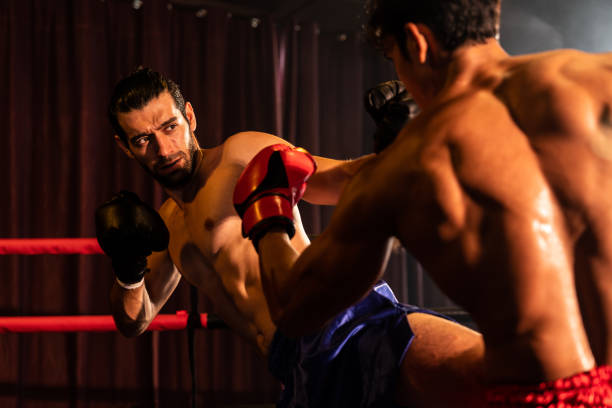 istock Asian and Caucasian Boxer unleash kick attack. Impetus 2086523971