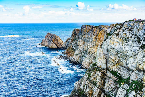 Seascape of Atlantic ocean and Asturias rocky coast at Cape Penas. Sea shore with high cliffs in north Spain.
