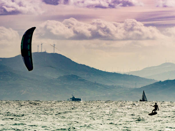istock Kite surfer riding waves. Kiteboarding sport. 2086537447