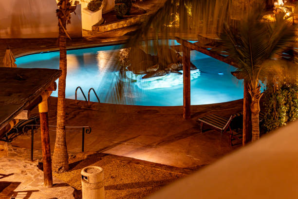 istock Night view of an illuminated swimming pool with blue background 2086584762