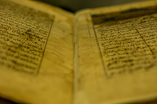 a book with an old arabic letters