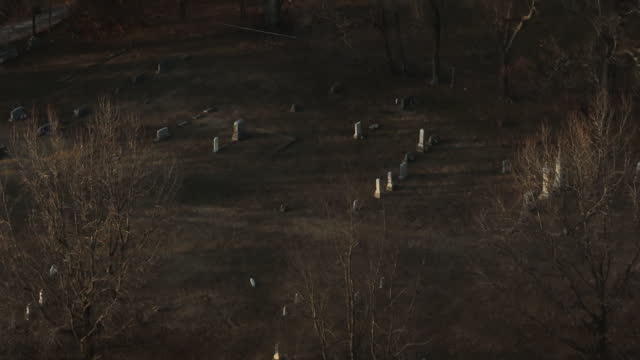 Aerial View Of Gravestones At Cemetery Near Lake Swepco In Arkansas, USA.