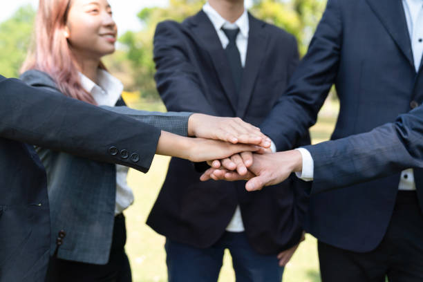 istock Eco business join hand together as teamwork and unity. Gyre 2086608293