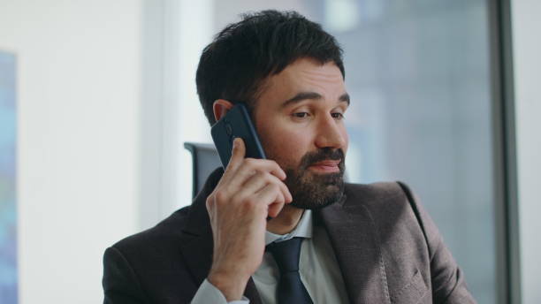 istock Businessman enjoy friendly smartphone conversation sitting office close up. 2086614054