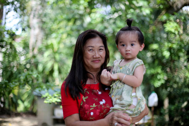 Portrait of grandmother and young grandson