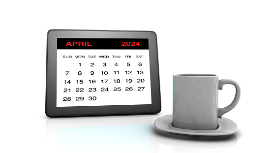 April 2024 calendar on Tablet PC and Coffee Cup
