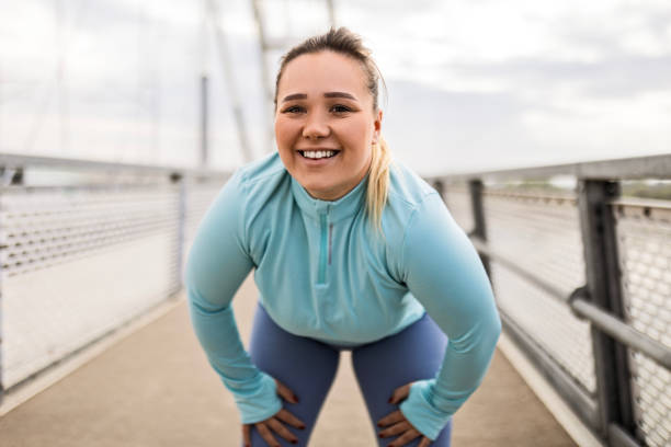 istock Overweight Woman Taking a Restorative Break 2086762902
