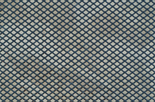 Fragment of the steel grid of the footbridge