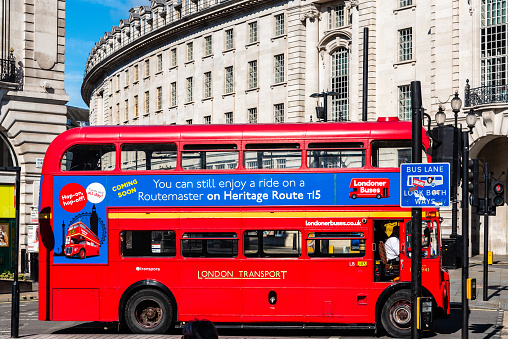 London, UK - August 27, 2023: Picadilly Circus at early morning during summer time. Old red bus