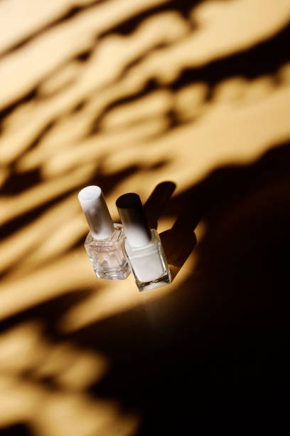protective nail polish and shine in the summertime sand background