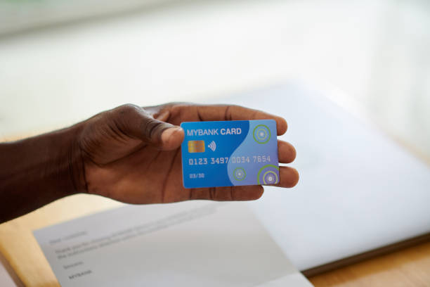 istock Black Man Showing Credit Card 2086812270
