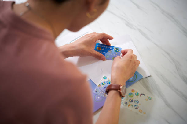Woman Customizing Credit Card