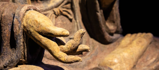 Ancient Buddha hand. Concept of energy, ethnic, harmony, meditation, peace