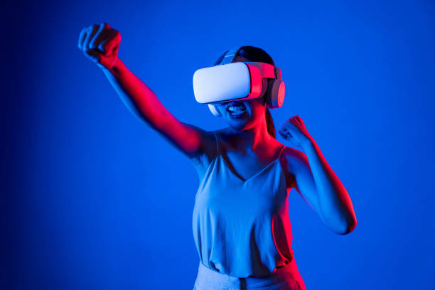 istock Elegant female connect metaverse punching playing fighting games. Hallucination. 2086839066