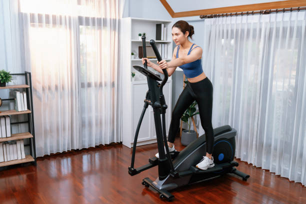 istock Energetic and strong athletic asian woman running on machine. Vigorous 2086847608