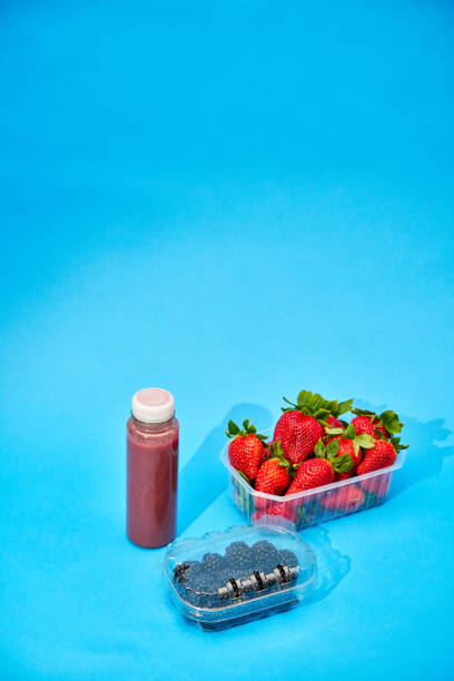 Healthy breakfast with fruits and berries, juice and muesli