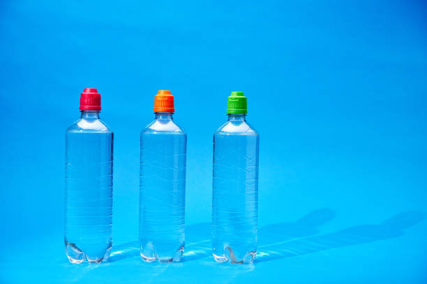 istock Water in Recycled PET Plastic Bottles on Blue Background 2086871668