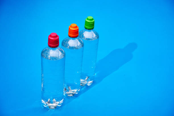 Various plastic PET packaging on a blue background.