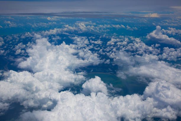 Sky view from the airplane window over Indonesia and ocean
