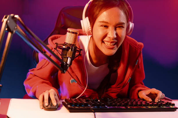 istock Host channel smiling Asian wearing headphone recording on phone. Stratagem. 2086904792