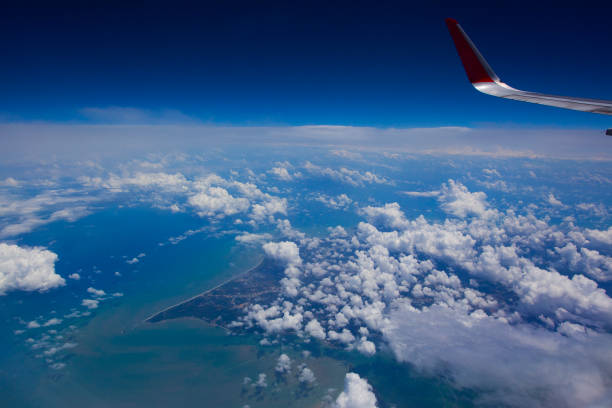 Sky view from the airplane window over Indonesia and ocean