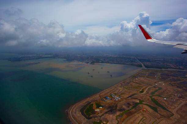 Sky view from the airplane window over Indonesia and ocean