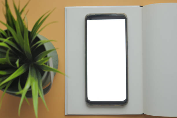 istock top view of smart phone and notepad on table 2086939205