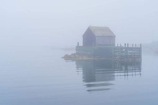 Misty morning settled in on Boathouse at Blue Rocks Nova Scotia.