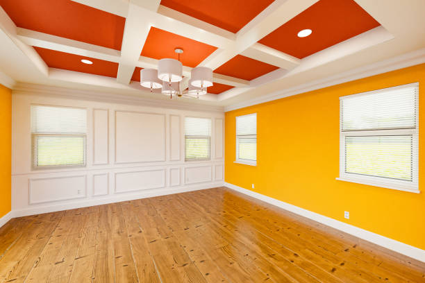 Beautiful Bold Red and Yellow Custom Master Bedroom Complete with Entire Wainscoting Wall, Fresh Paint, Crown and Base Molding, Hard Wood Floors and Coffered Ceiling