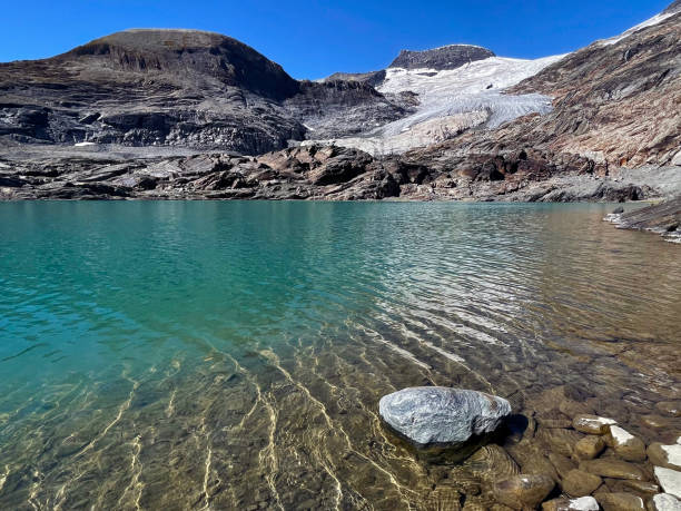 alpine ice reflections: panoramic glacier lake views, hautes alps, france - european alps europe high up lake ストックフォトと画像