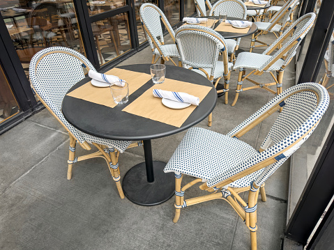 Charming parisian sidewalk cafe,outdoor tables, Paris, France