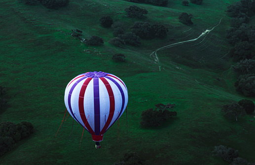 Hot air balloon in flight through Carmel Valley

Taken in Carmel Valley, California, USA.