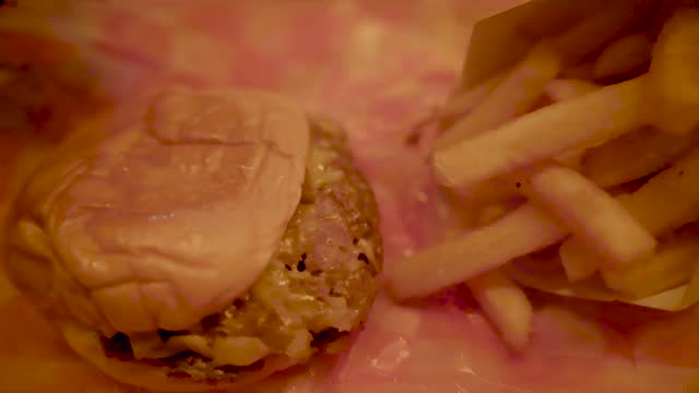 Pan Right Close up Slow Motion Burger and Fries Village Manhattan New York 4k
