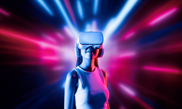 istock Elegant female connecting metaverse looking faraway and smiling. Hallucination. 2087077036