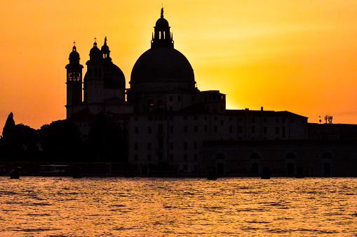 Basilica in silhouette at sunset in Venice