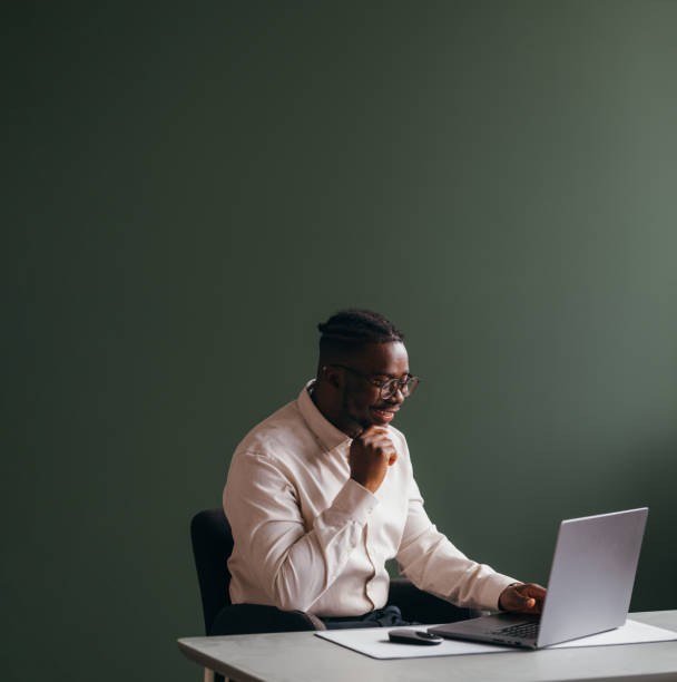 istock Professional Man Working on Laptop in Modern Office 2087154867