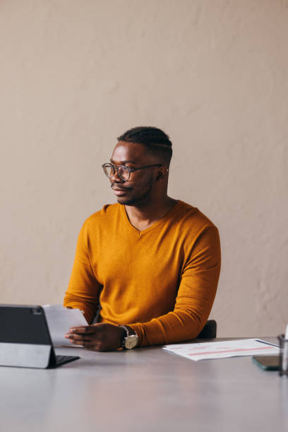istock Professional Man Working on Tablet at Modern Office Desk 2087154881