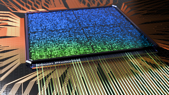 Abstract 3d render of a silicon chip with photonic interconnect.  Silicon Photonic is labeled on the interface