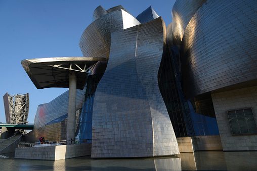 BILBAO, SPAIN - 03 18  2019: Guggenheim Museum Bilbao by Canadian-American architect Frank Gehry.