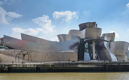 BILBAO, SPAIN - 03 18  2019: Guggenheim Museum Bilbao by Canadian-American architect Frank Gehry.