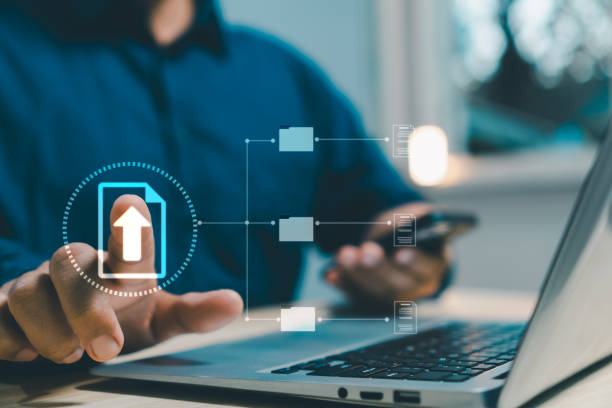 istock concept document managemente-signing, electronic signature, Paperless workplace. man touch file on virtual screen online documentation database and process automation to efficiently manage files. 2087342859