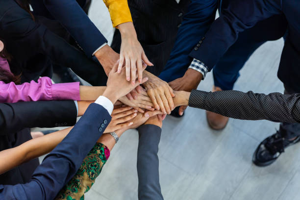 istock Diversity people putting their hands together. Showing unity. Intellectual. 2087386206