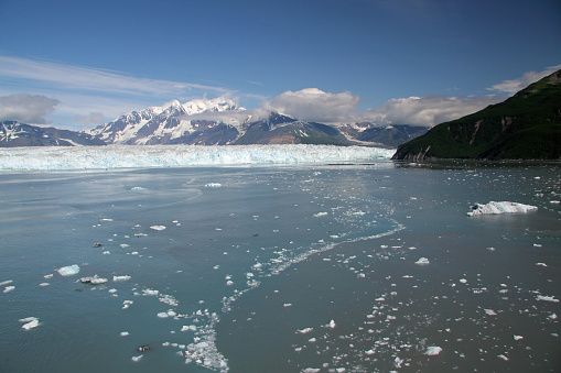 Disenchantment Bay, Hubbard Glacier and surrounding mountains, Alaska on sunny summer morning.