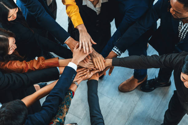 istock Diversity people putting their hands together. Showing unity. Intellectual. 2087450458