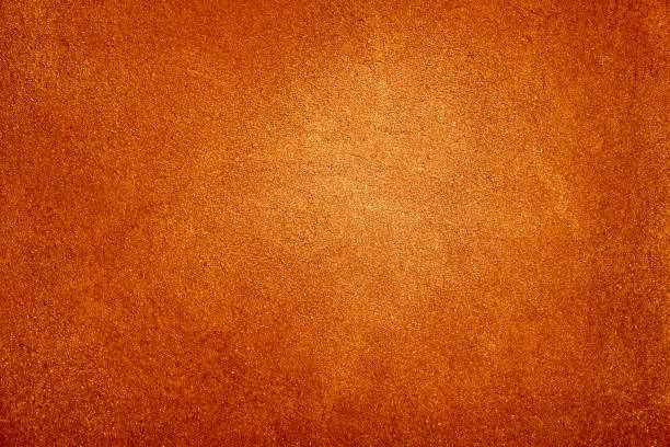 Brown red orange yellow abstract background. Paint. Old wall. Bright burnt light fire. Grunge rough grain dirty damaged rusty distressed broken. Brown red orange yellow abstract background. Painted old wall. Bright burnt hot light fire. Grunge rough grain dirty damaged rusty distressed broken surface. Design. burnt orange paint stock pictures, royalty-free photos & images