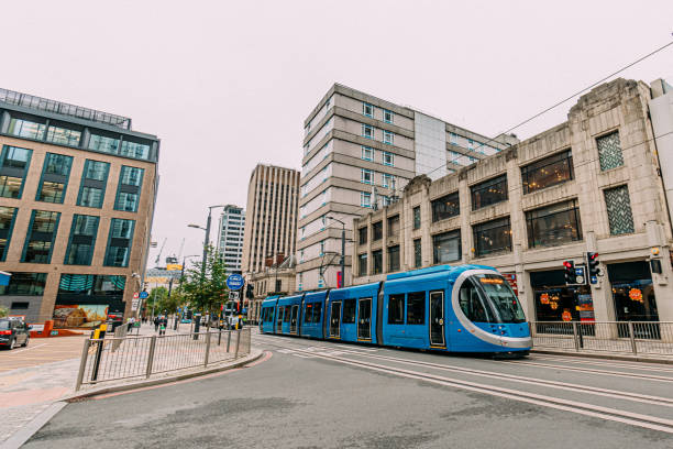 Blue Public City Train in Birmingham City Centre on an Overcast Day in Autumn