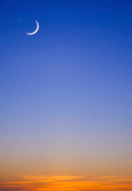 istock Crescent moon and star on twilight sky vertical background in early morning before sunrise with copy space 2087662011